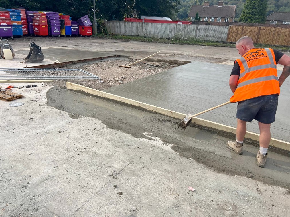 Haka Groundworks Operative Finishing a Concrete Slab